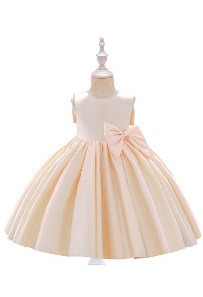 فستان الأميرة بلا أكمام بفيونكة كبيرة الظهر باللون الكريمي للأطفال