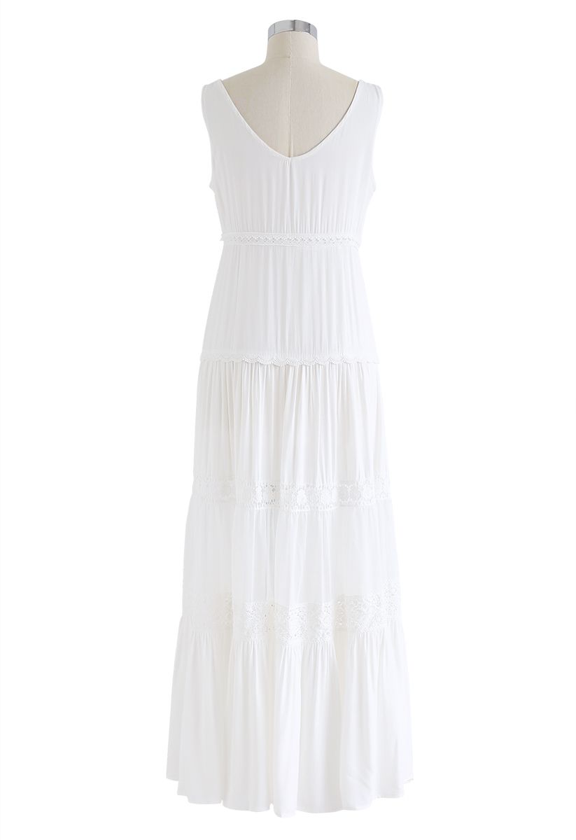 كروشيه فستان طويل بدون أكمام بأزرار من الأسفل باللون الأبيض