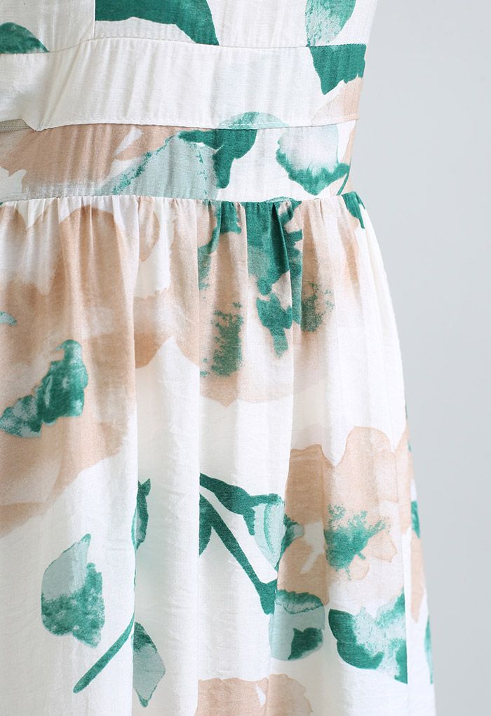فستان ماكسي مزين بالزهور بألوان مائية صيفية