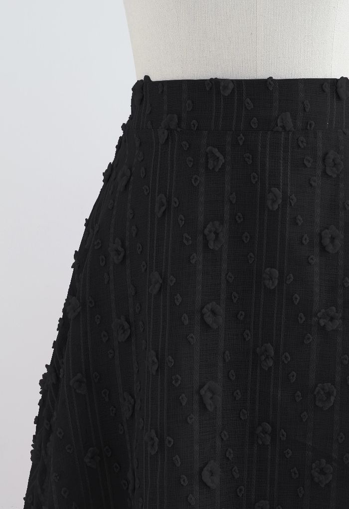 تنورة متوسطة الطول من القطن كاندي ثلاثي الأبعاد باللون الأسود