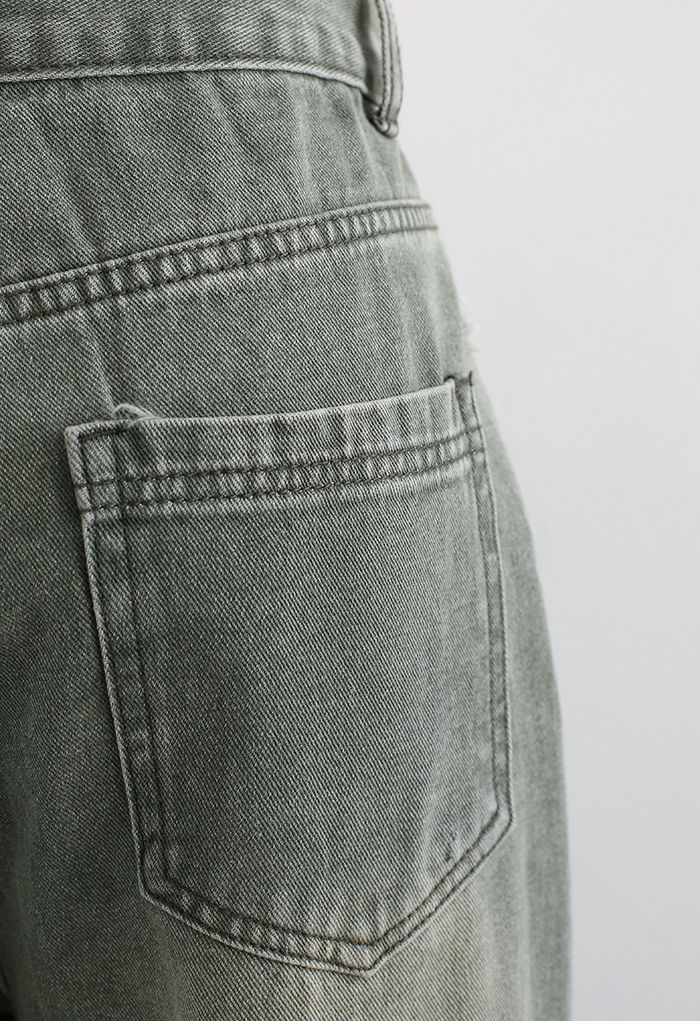 بنطلون جينز واسع الساق مغسول مزين بشرابة من المريمية