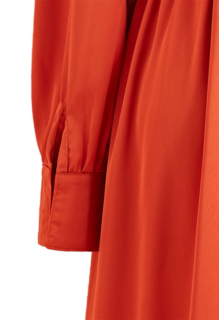 فستان ستان ملفوف بحافة كشكش غير متماثل باللون البرتقالي