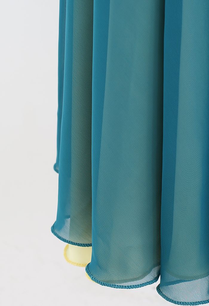 تنورة ماكسي ملفوفة وربطة على الخصر باللون الأزرق المخضر