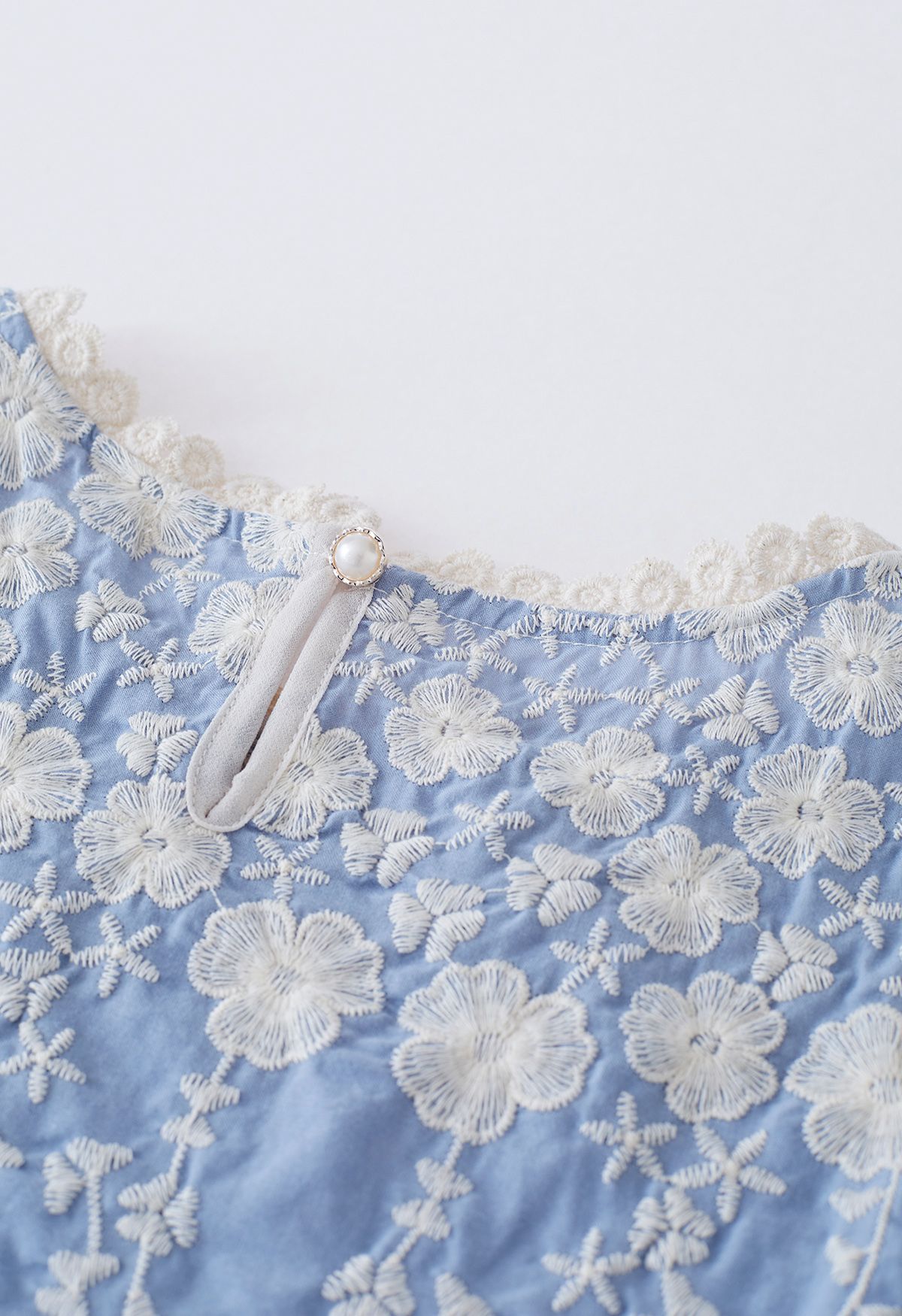 Clover Branch Embroidered Dolly Top in Blue
