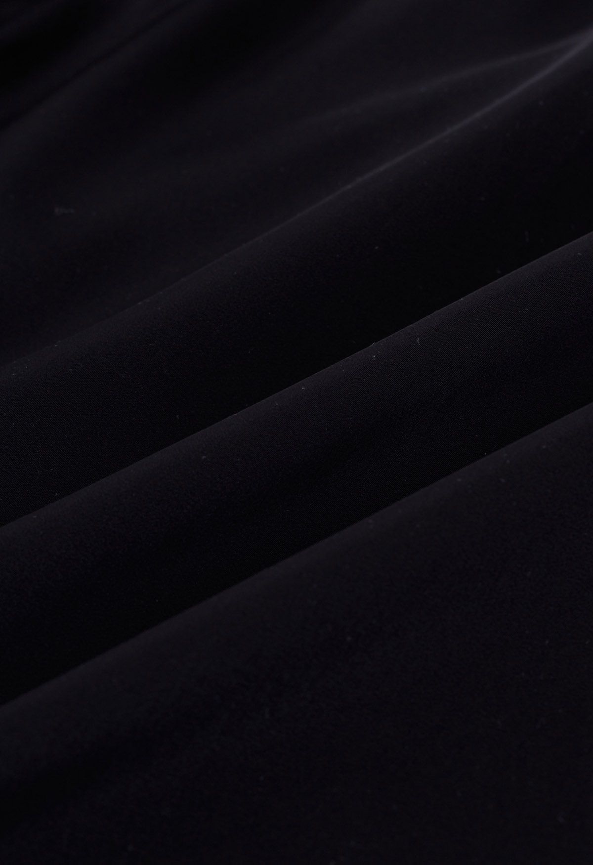 Wrap Front Short-Sleeve Spliced Top in Black