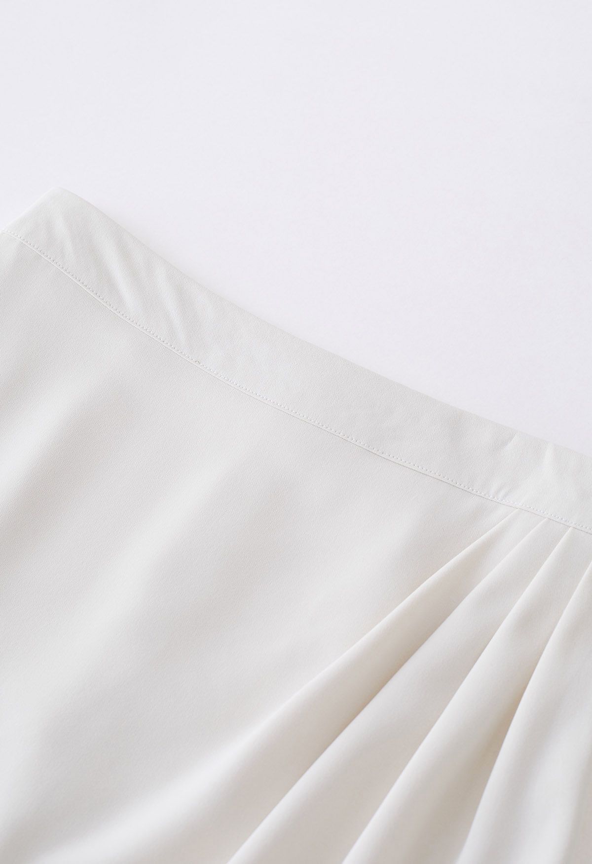 Side Pleated Tulip Midi Skirt in Ivory
