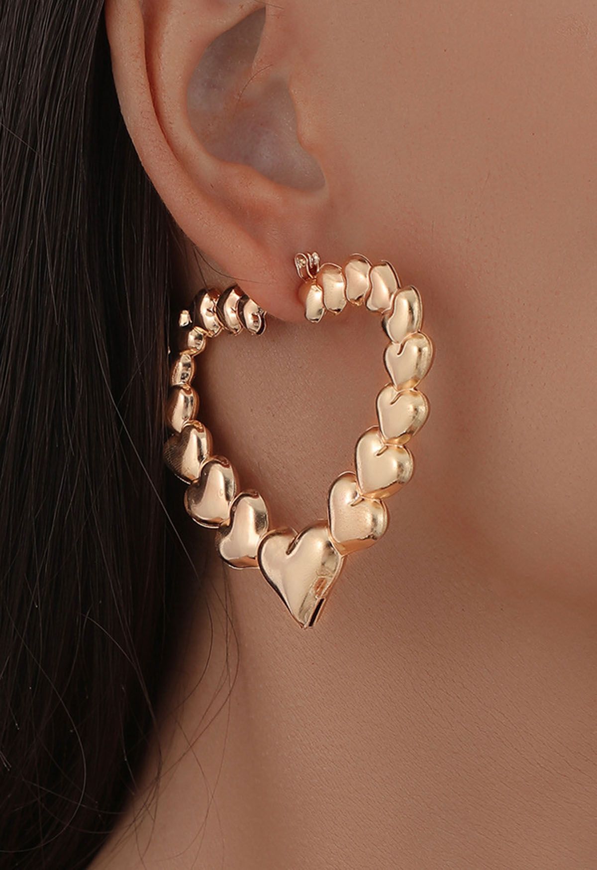 Hollow Out Metal Heart Earrings in Gold
