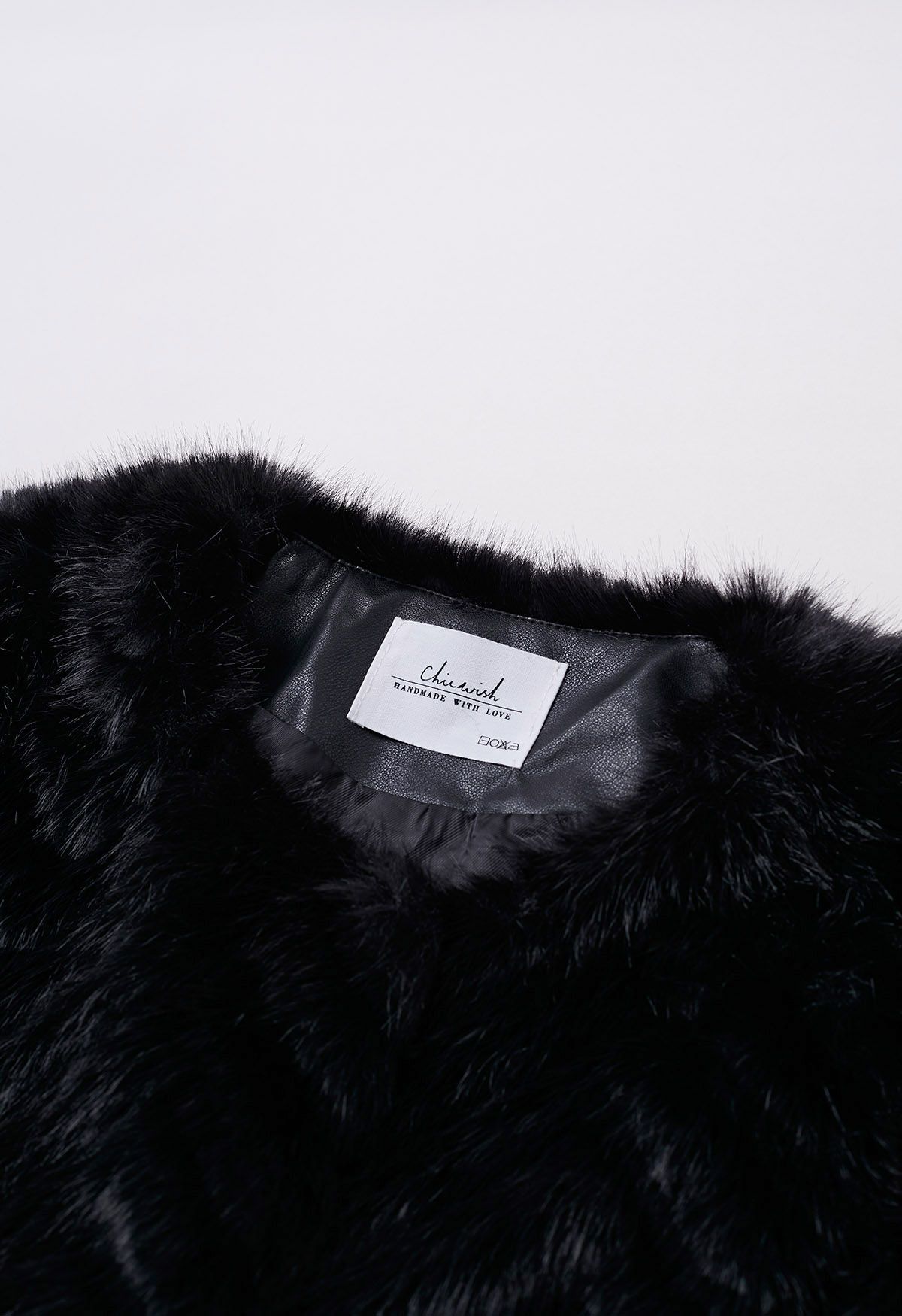 Posh Faux Fur Coat in Black