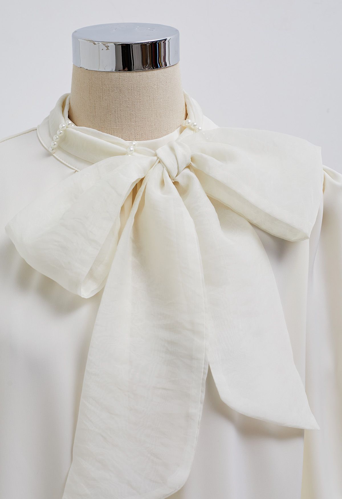 Pearl Neckline Side Bowknot Satin Top in Cream