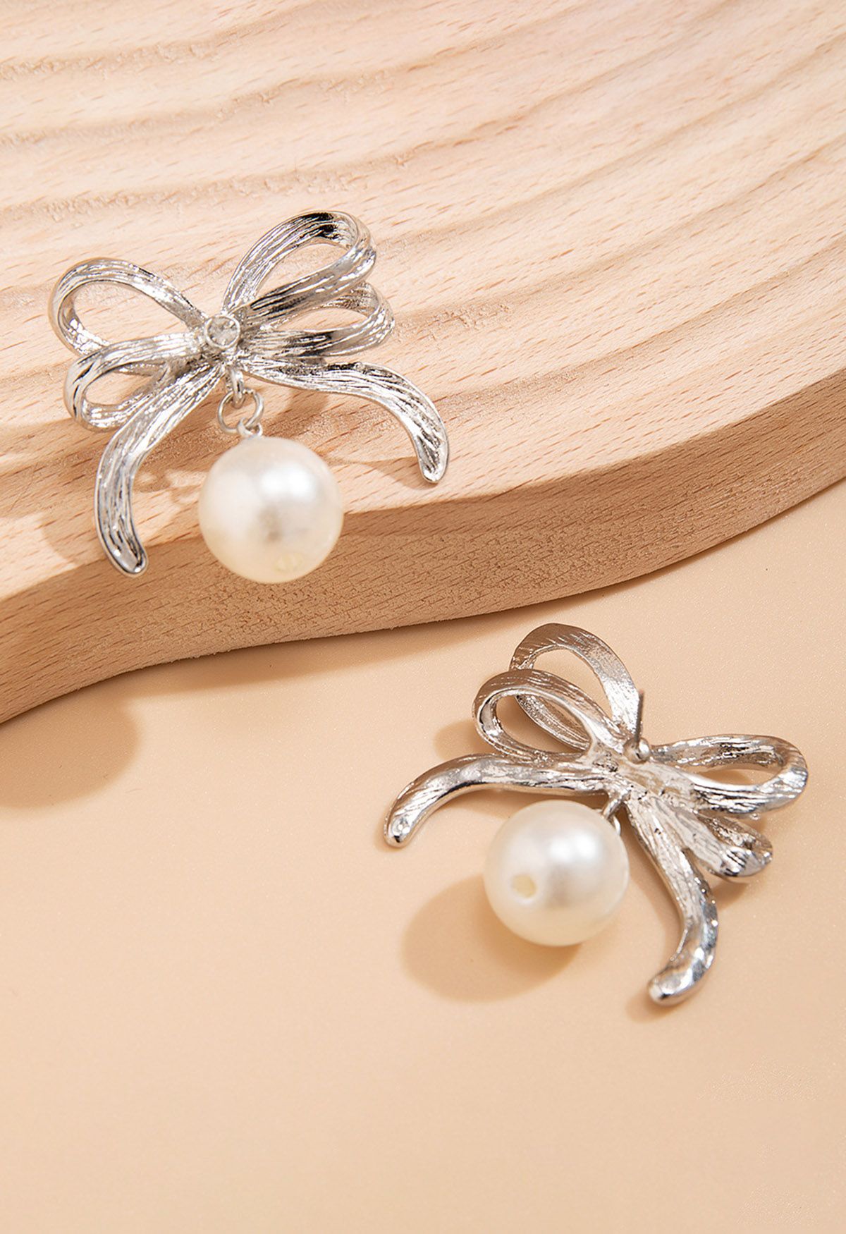 Double Layered Bowknot and Pearl Earrings in Silver