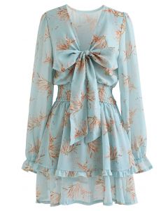 فستان قصير شيفون بنقشة زهور وربطة عنق أمامية باللون الأزرق المخضر