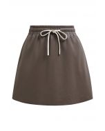 Faux Leather Drawstring Waist Mini Skirt in Brown